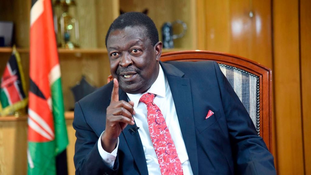 mudavadi-interview-16913794960175168781-1024x576 Malalah Roars in Malava Despite Microphone Sabotage, Fires Salvos At Ruto, Musalia And Wetangula